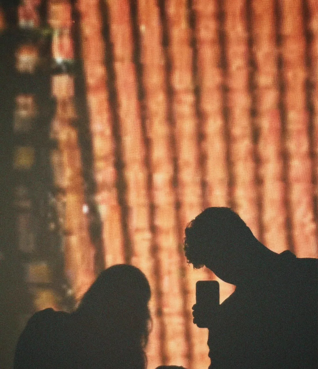 The two of you together in silhouette under warm lights