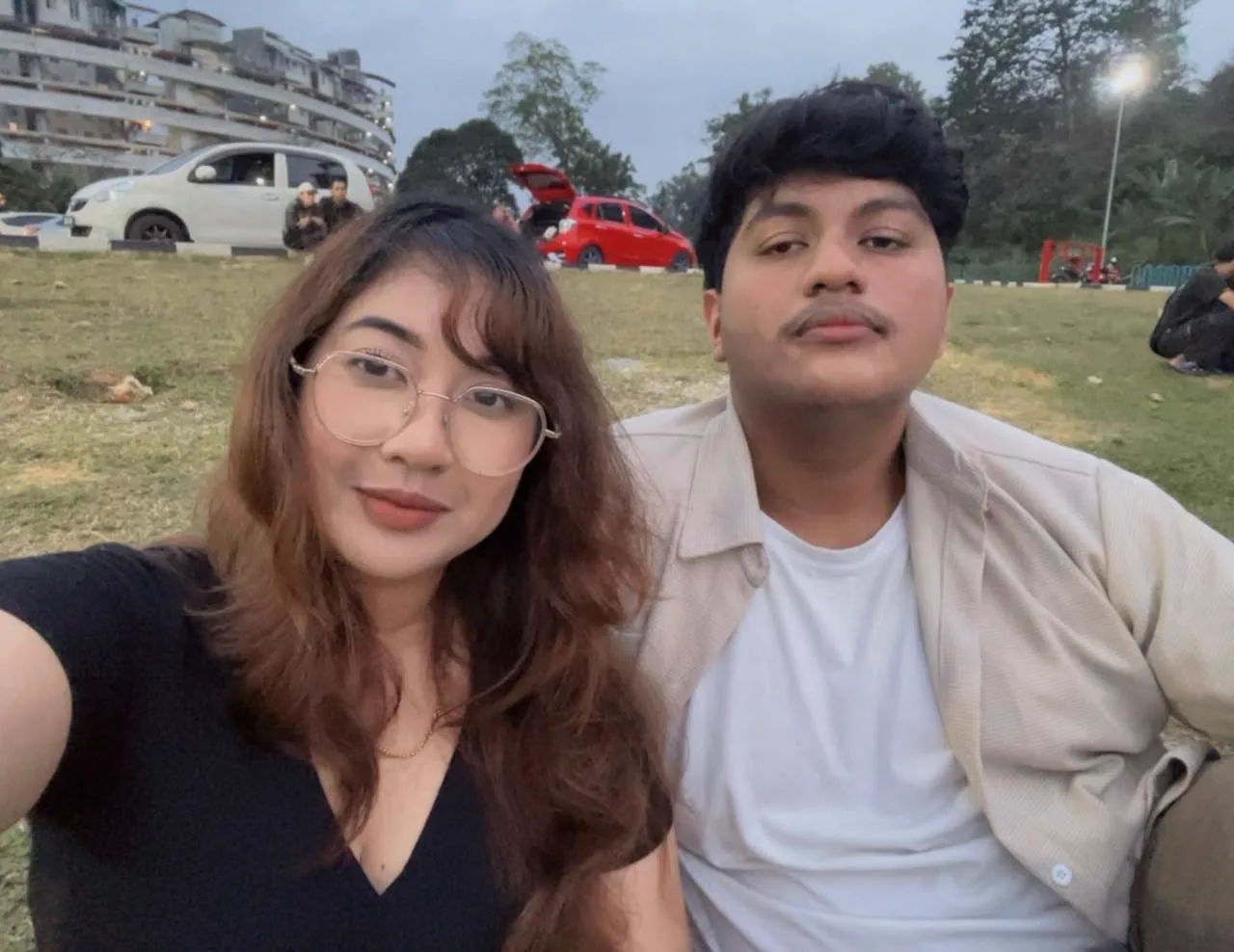 The two of you taking a selfie outdoors while Sera wears glasses