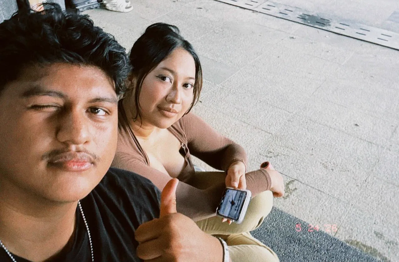 The two of you sitting together outdoors