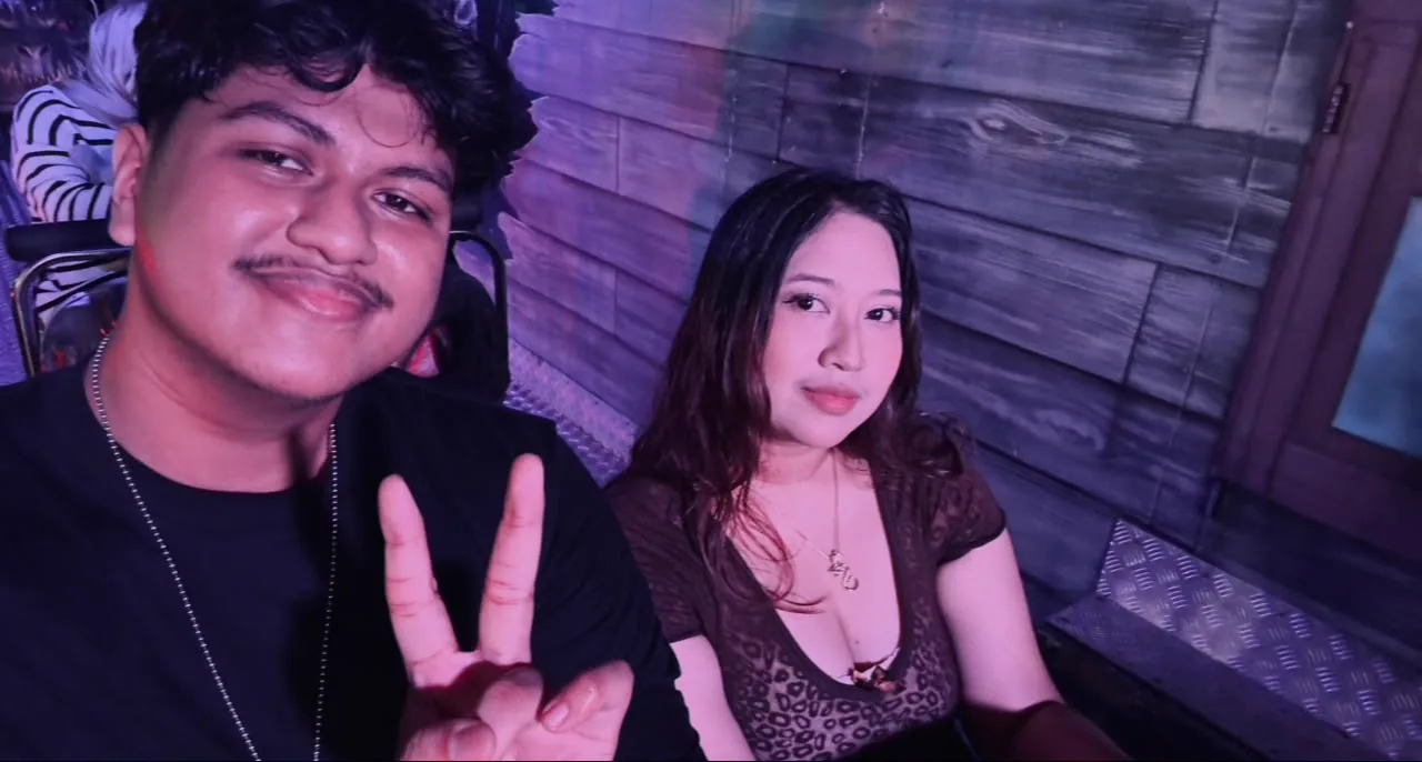 The two of you under purple lights